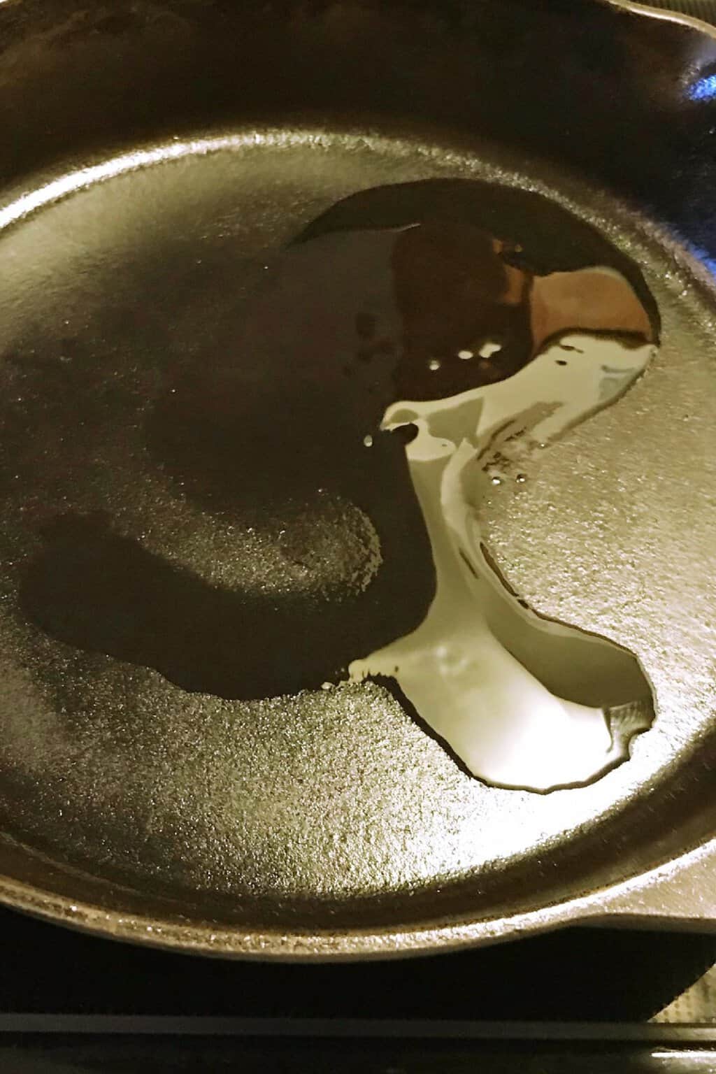 Oil on a skillet before cooking.