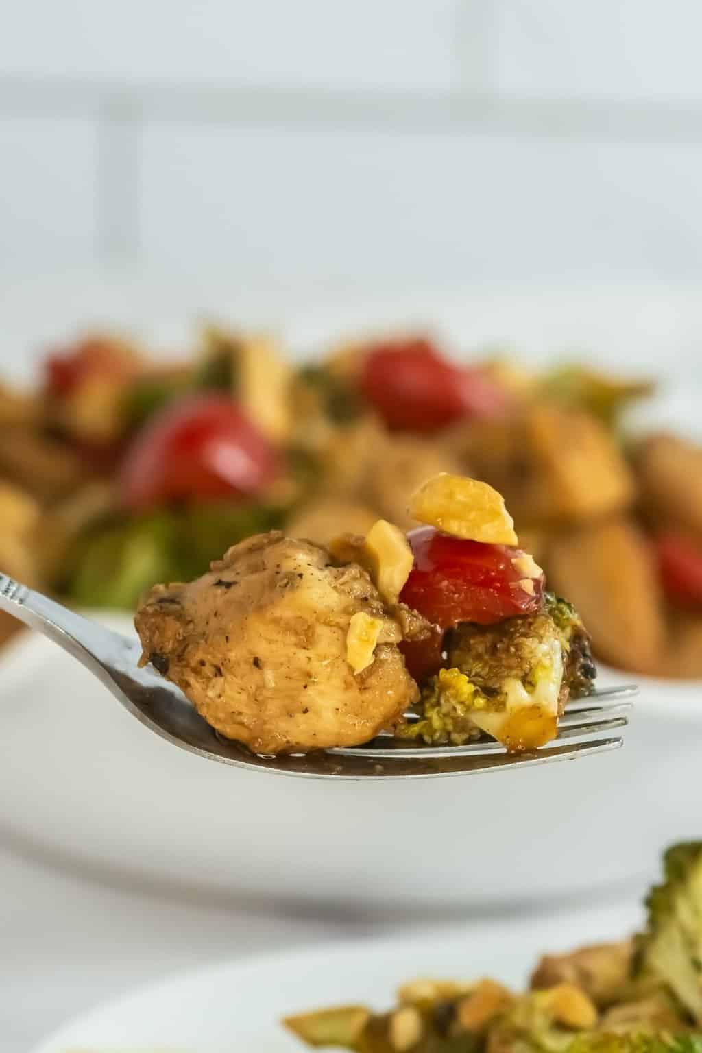 Stir fry ingredients on a fork.