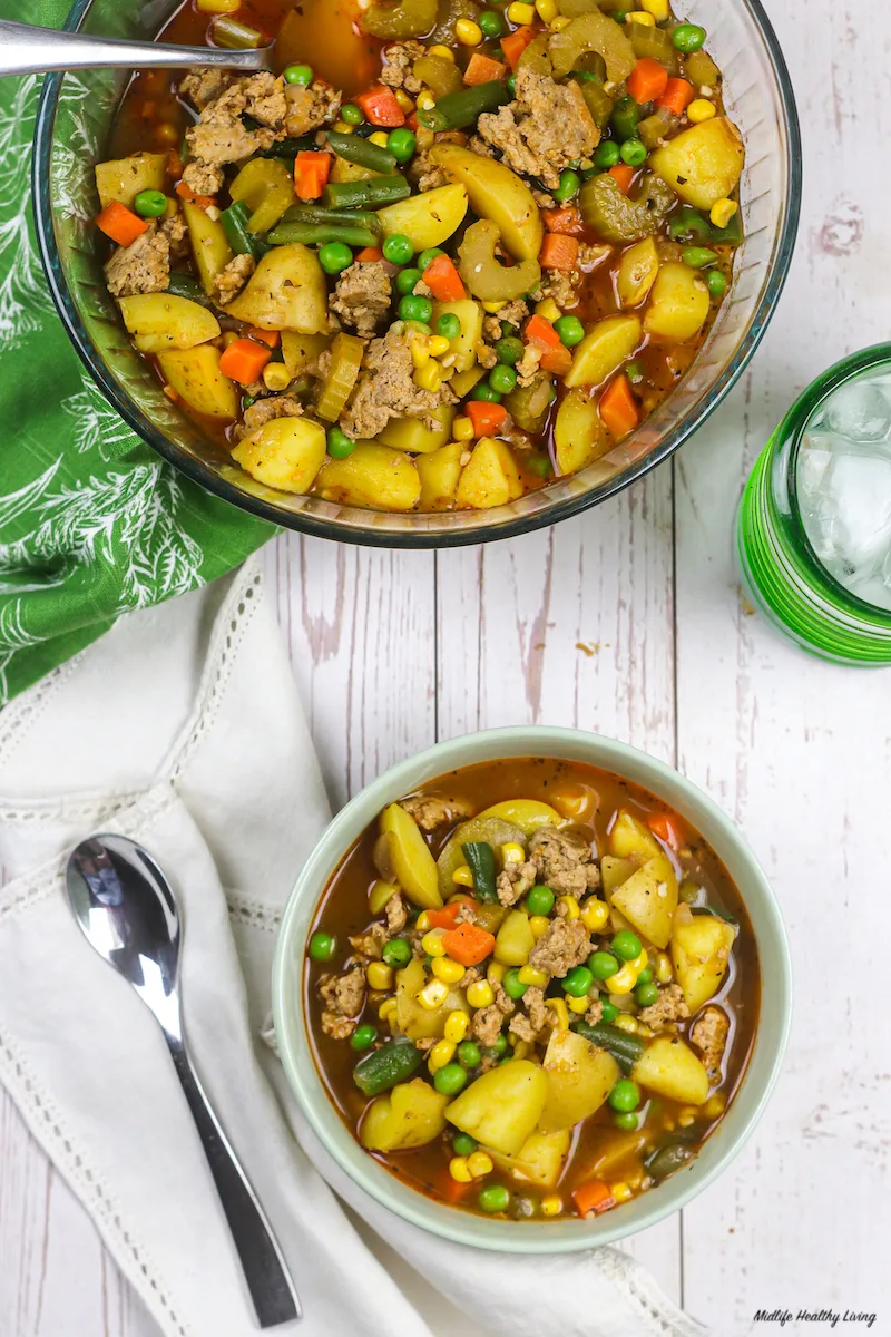 https://www.midlifehealthyliving.com/wp-content/uploads/2022/10/Serving-Bowl-and-Individual-Serving-of-Ground-Turkey-Vegetable-Soup.jpg.webp