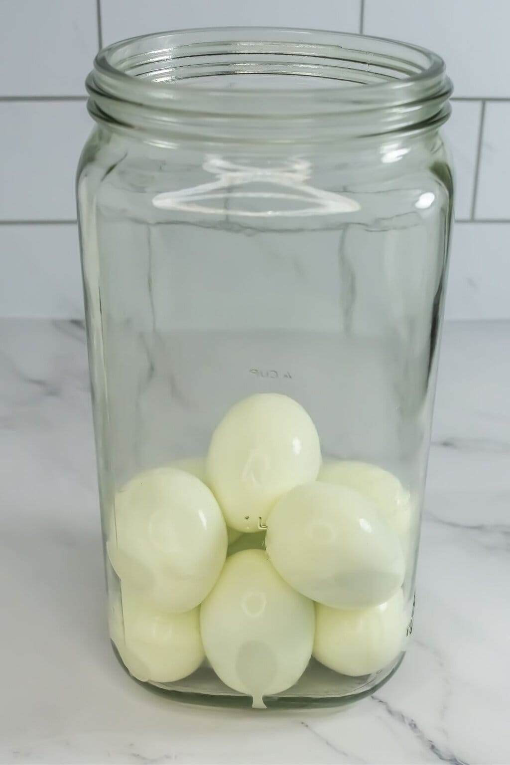 Eggs placed in a glass jar.