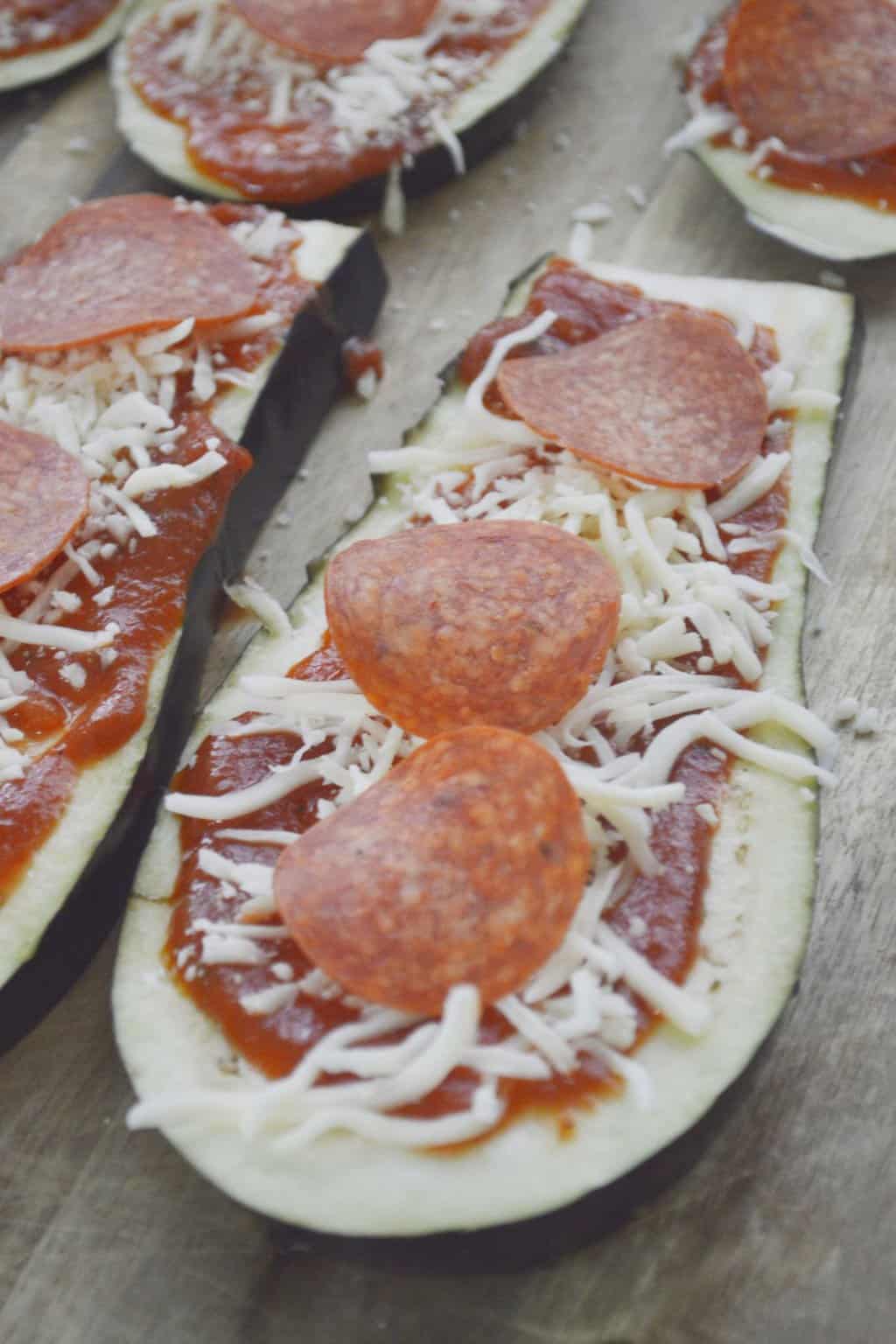 Pepperoni and cheese added on eggplant.