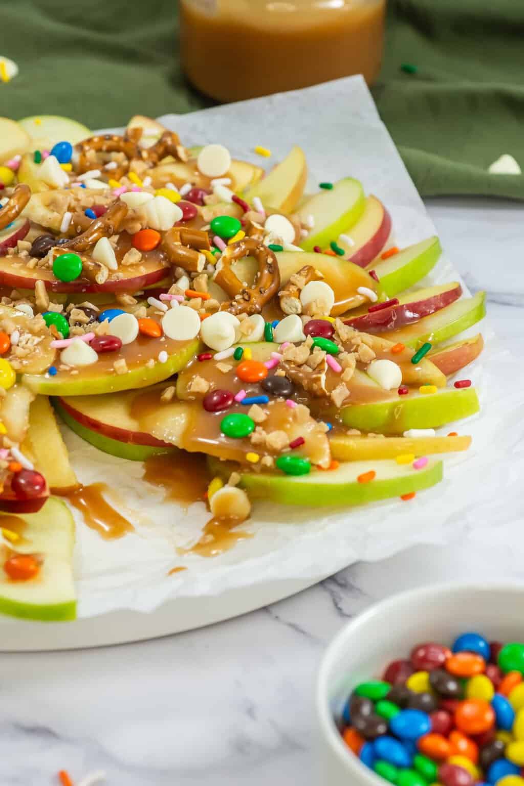 Candy apple nachos on a plate.