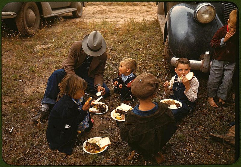 Homesteader And Children Eating Barbecue