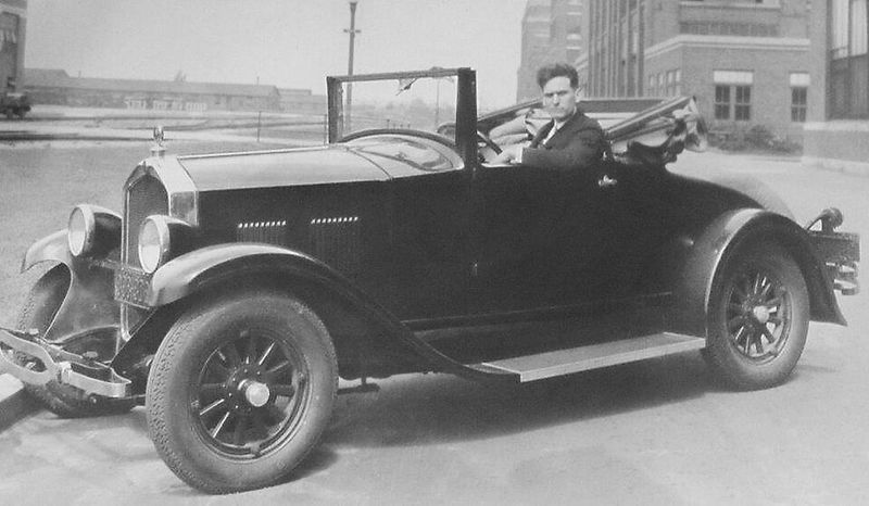 Early Automobiles on Dusty Roads