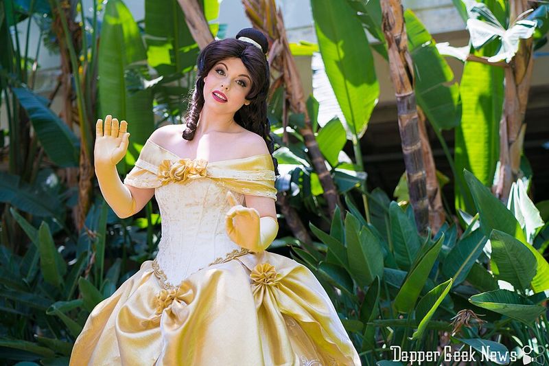 Belle's Blue Dress Quietly Marks Her As An Outsider