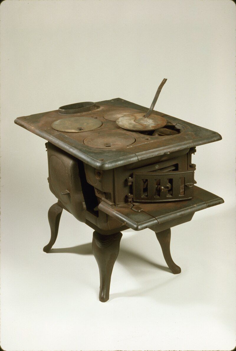 Tending A Coal Stove Or Scuttle