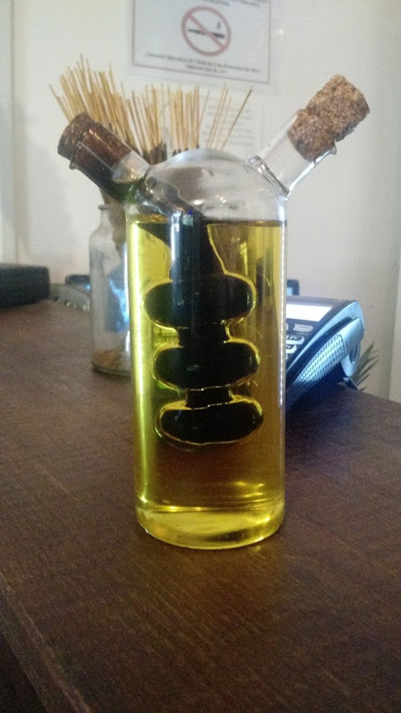 Dipping Bread In Olive Oil And Balsamic Like A Starter