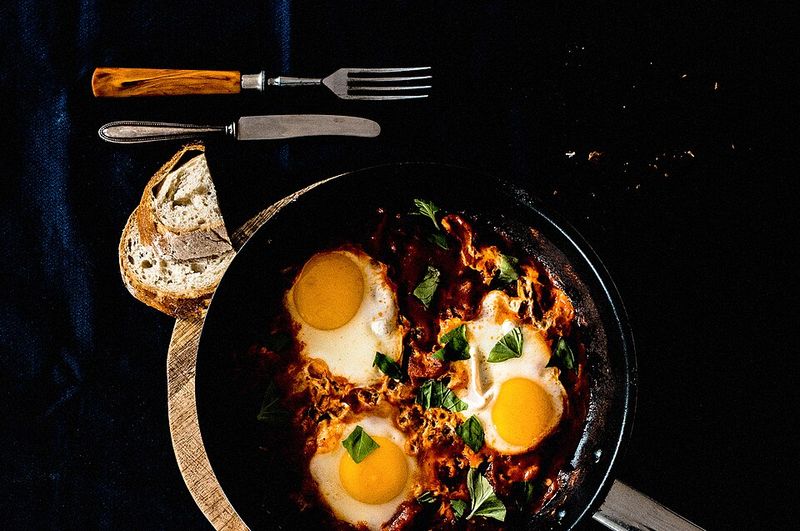 Shakshuka With Eggs In A Cast Iron Skillet