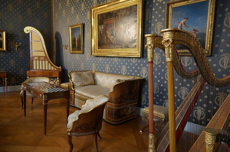 Formal Music Rooms With Grand Pianos and Harps