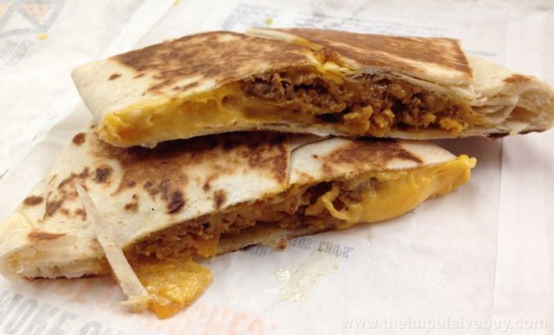 Beefy Cheddar Crunchwrap Slider – Taco Bell