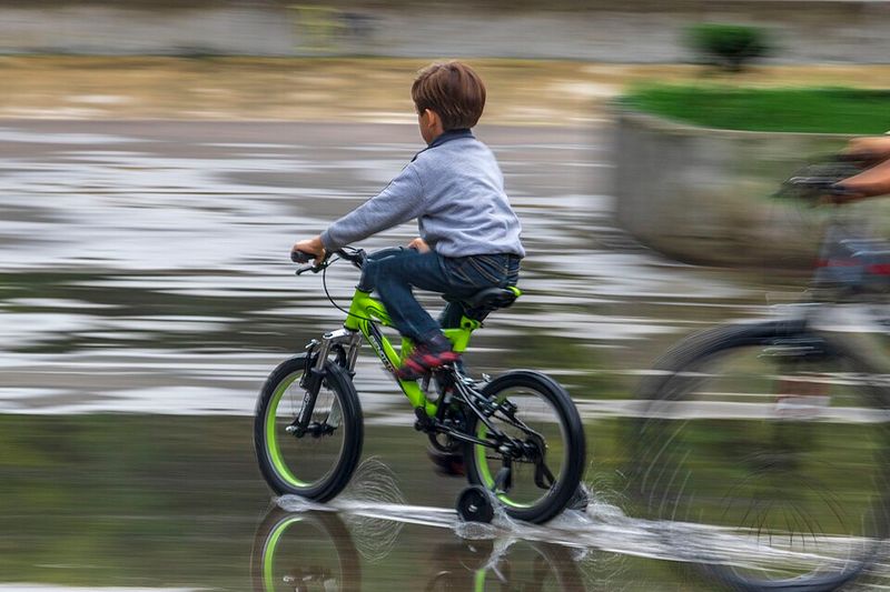 Roaming The Neighborhood On Bikes Without Helmets