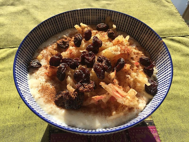 Oatmeal Porridge With Shredded Apple, Raisins, Cinnamon, Honey