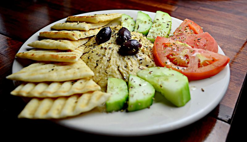 Mediterranean Snack Plate Dinner: Hummus, Olives, Veggies, and Crackers