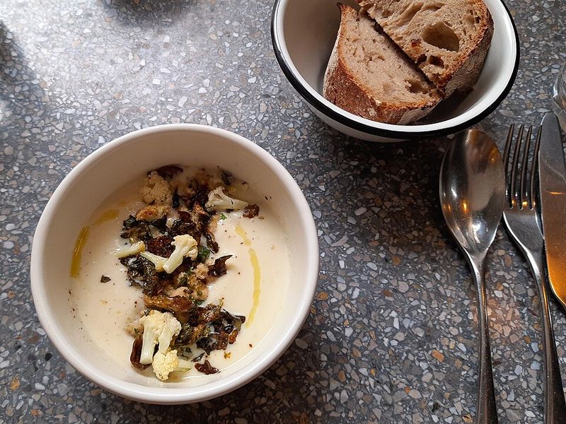 Cauliflower Soup with Glazed Almonds and Marjoram