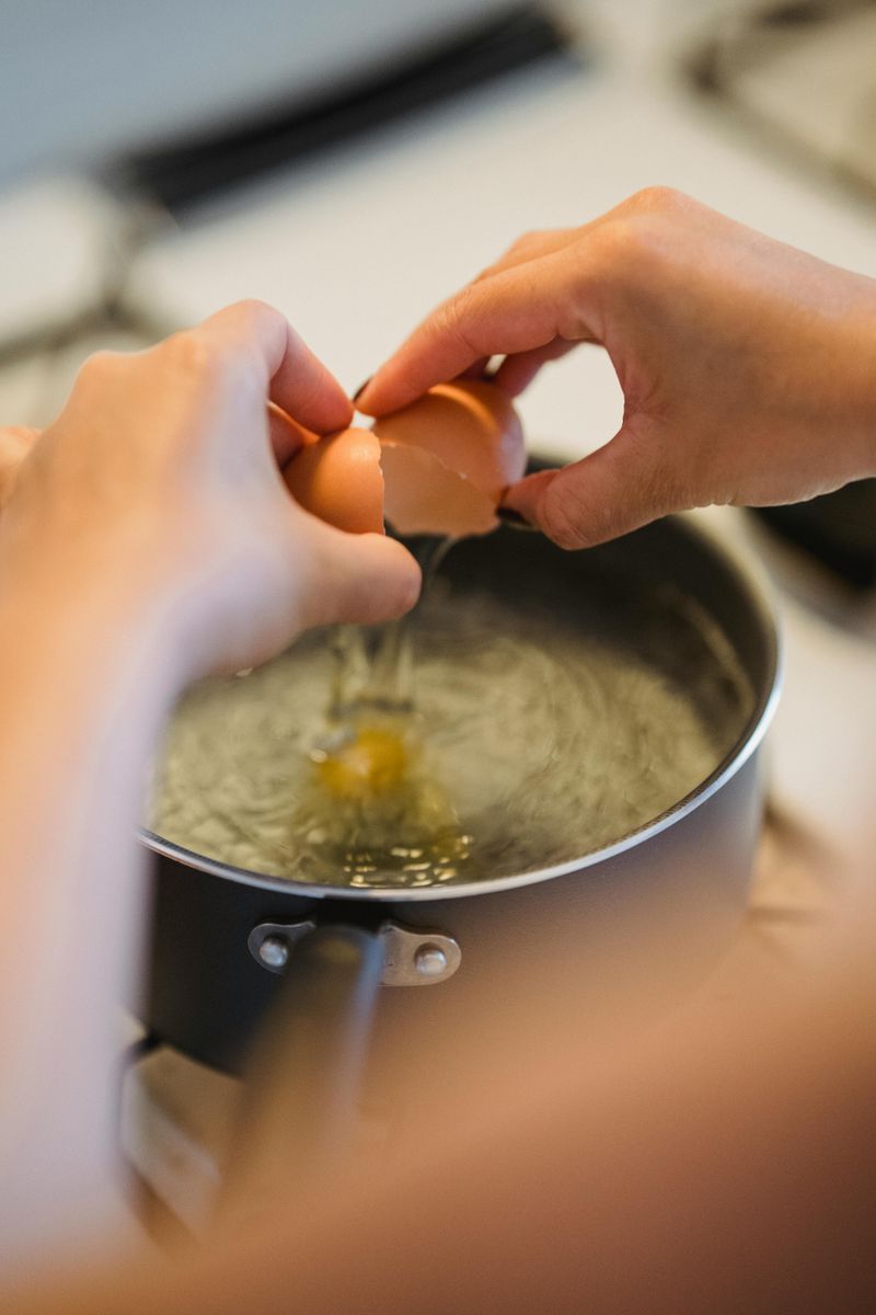 Poach Eggs In Barely Simmering Water, Not A Rolling Boil