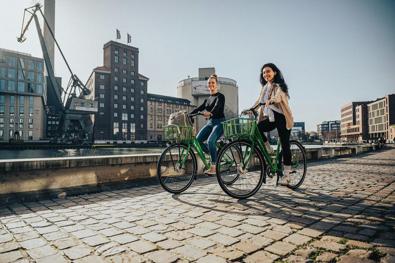 Women Riding Bicycles